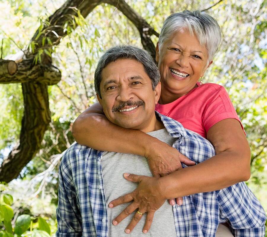 Couple, man and woman, outside embracing