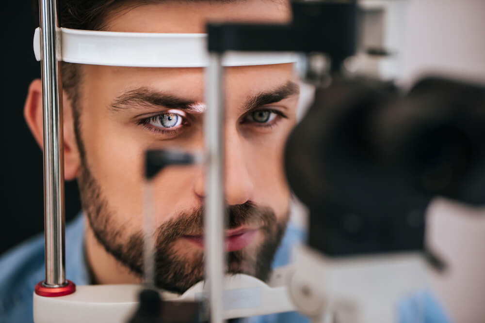 man getting eye exam