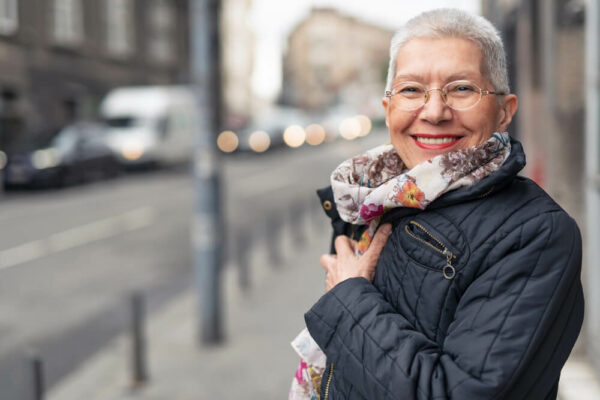 mature woman wearing glasses and scarf