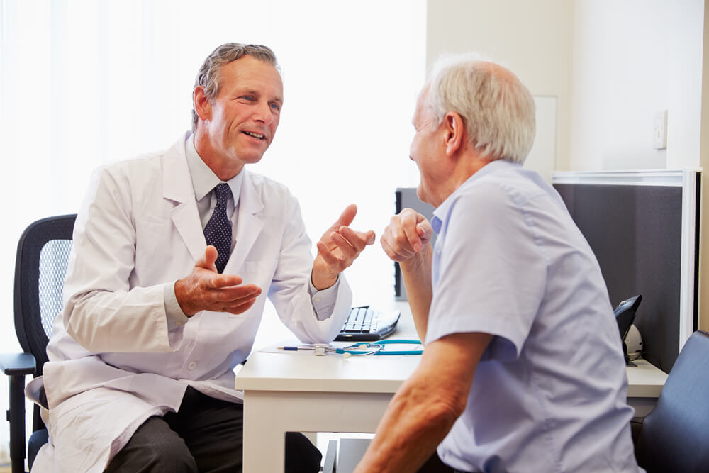 doctor talking to patient