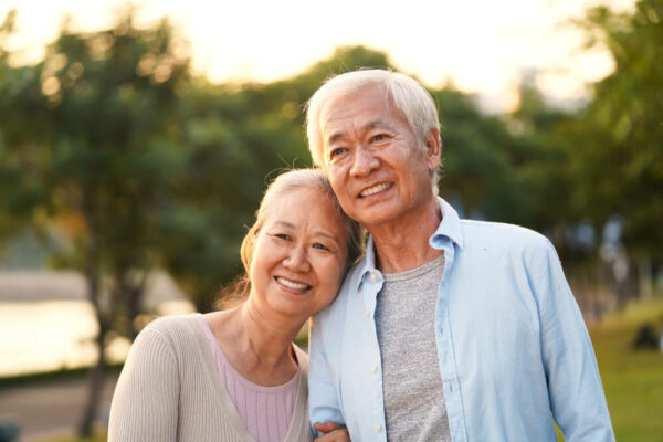 mature couple at sunset